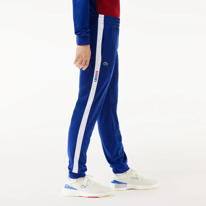 Sweatpants and Trousers Men Lacoste Men039s AbrasionResistant Tennis Sweatpants Navy Blue White Nuv