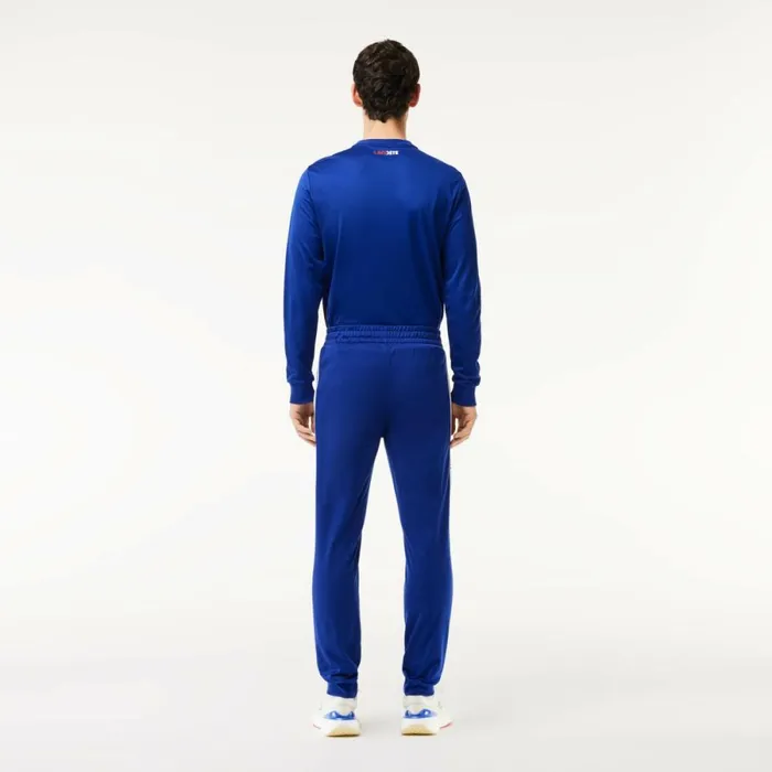 Sweatpants and Trousers Men Lacoste Men039s AbrasionResistant Tennis Sweatpants Navy Blue White Nuv